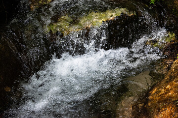 water flowing over rocks