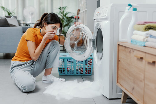 Broken washing machine at home Stock Photo | Adobe Stock