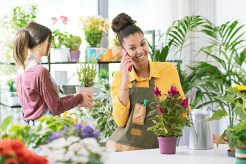 Florist taking orders over the phone