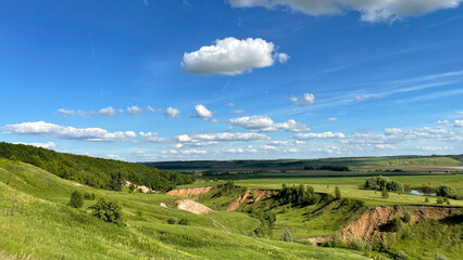 green ravines and plains with small trees