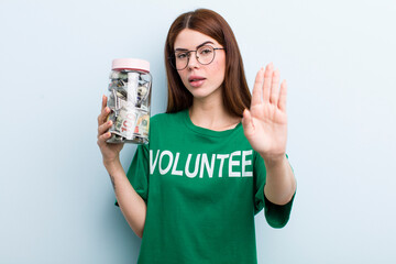 young adult pretty woman volunteer and donation concept