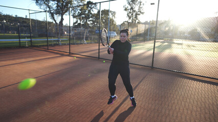 Amateur tennis player, Girl practicing playing tennis, on a tennis court, in Melbourne Australia 