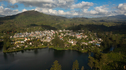 Fototapeta na wymiar Top view of town of Maskeliya among the mountains and tea plantations. Sri Lanka.