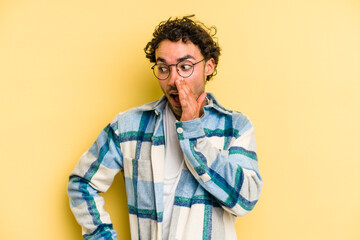 Fototapeta premium Young caucasian man isolated on yellow background shouting excited to front.