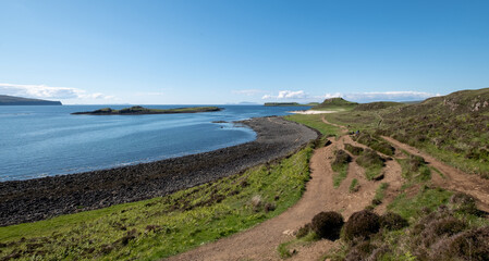 Panoramic view of the Dunvegan coastline in north west Skye, Scotland UK, with Claigan Coral Beach in the distance. The beach is made of crushed white coral.