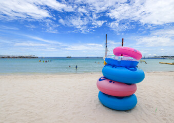 Chonburi,Eastern Thailand on September 26,2020:Colorful swim rings at Tawaen Beach,Koh Larn,Pattaya.