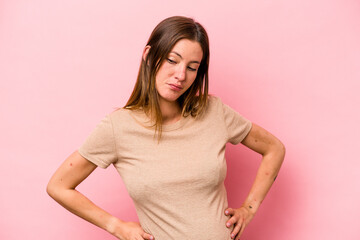 Young caucasian pregnant woman isolated on white background confused, feels doubtful and unsure.