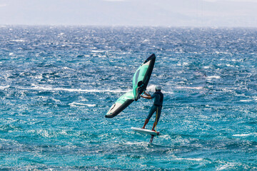 Naxos Greece.06-02-2022. Kite surf and Wind surf at Naxos Greece. - obrazy, fototapety, plakaty