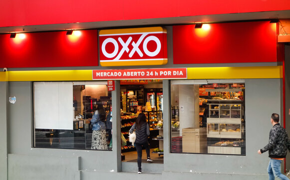 Sao Paulo, Brazil: Exterior view of facade of OXXO mini market 24h