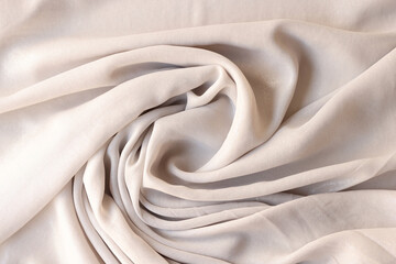 White creamy synthetic cotton fabric background. Texture fabric concept