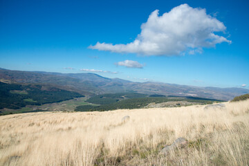 Cute clouds over the countryside in Avila. Blue sky