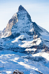 Winter mountain landscape. Snowy mountain Matterhorn during the day in winter. Zermatt, swiss alps © caftor
