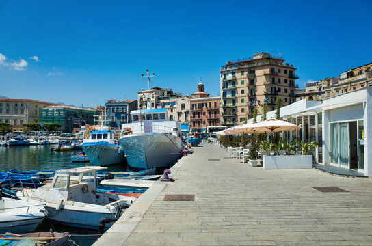Palermo, Sicily - July 29, 2016: Small port with fishing boats in the center of Mondello