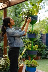 Girl gardening in backyard