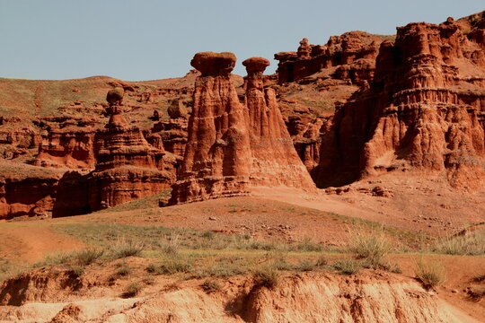 Landscape with red mountains Narman Peribacalari, formed due to erosion and weathering, against the blue sky, near the city of Erzurum, in the region of Eastern Anatolia, Turkey