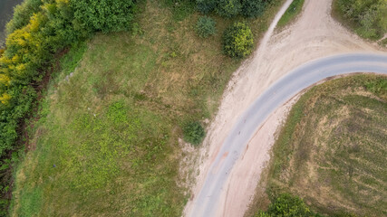 Drone image. aerial view of rural area with fields, trees, paths and roads. High quality photo