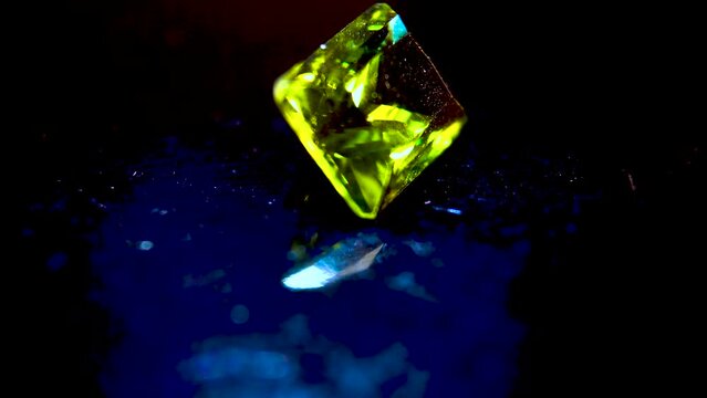 Close-up. Exquisite gemstone chrysolite. Polished peridot