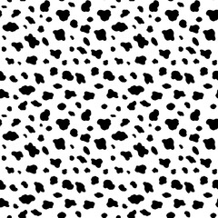 Abstract modern cow fur seamless pattern. Animals trendy background. Black and white decorative vector illustration for print, card, postcard, fabric, textile. Modern ornament of stylized skin