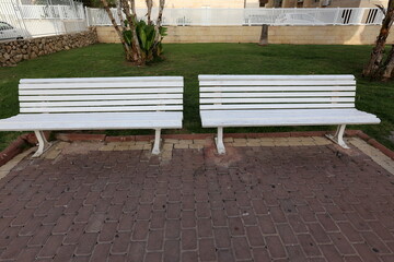 Bench in a city park on the Mediterranean coast