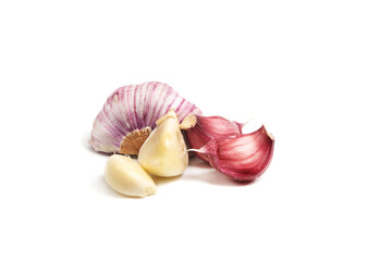 Slices of fresh pink garlic on a white background. Isolated
