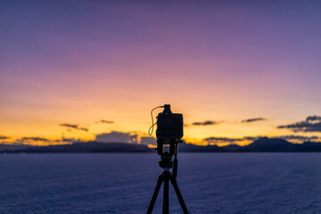 Bonneville Salt Flats near Salt Lake City, Utah at colorful twilight after sunset with purple and...