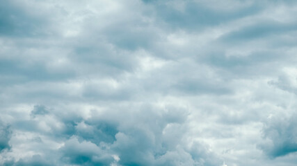 White clouds on a background of blue sky