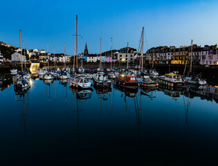 boats in the harbor at night