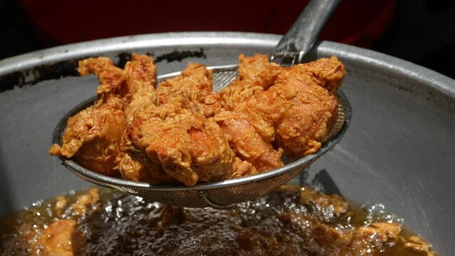  Fried chicken in deep fry outdoor 