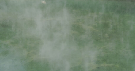 Hot spring river flow over Xinbeitou thermal valley in Taiwan