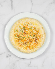 Chicken, onion, eggs, cheese and potato omelette