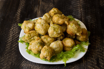 Seaweed fritters, or zeppoline, are small pieces of deep-fried grown dough typical of the Neapolitan tradition.
