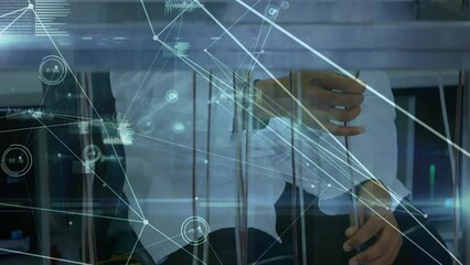 Animation of data processing over biracial male doctor with blood bags - Powered by Adobe