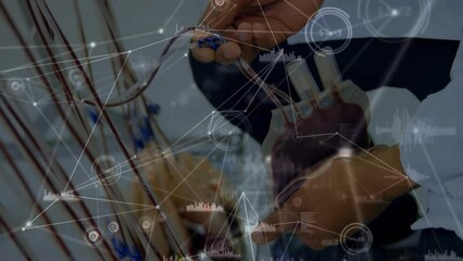 Animation of data processing over biracial doctor with blood bags - Powered by Adobe