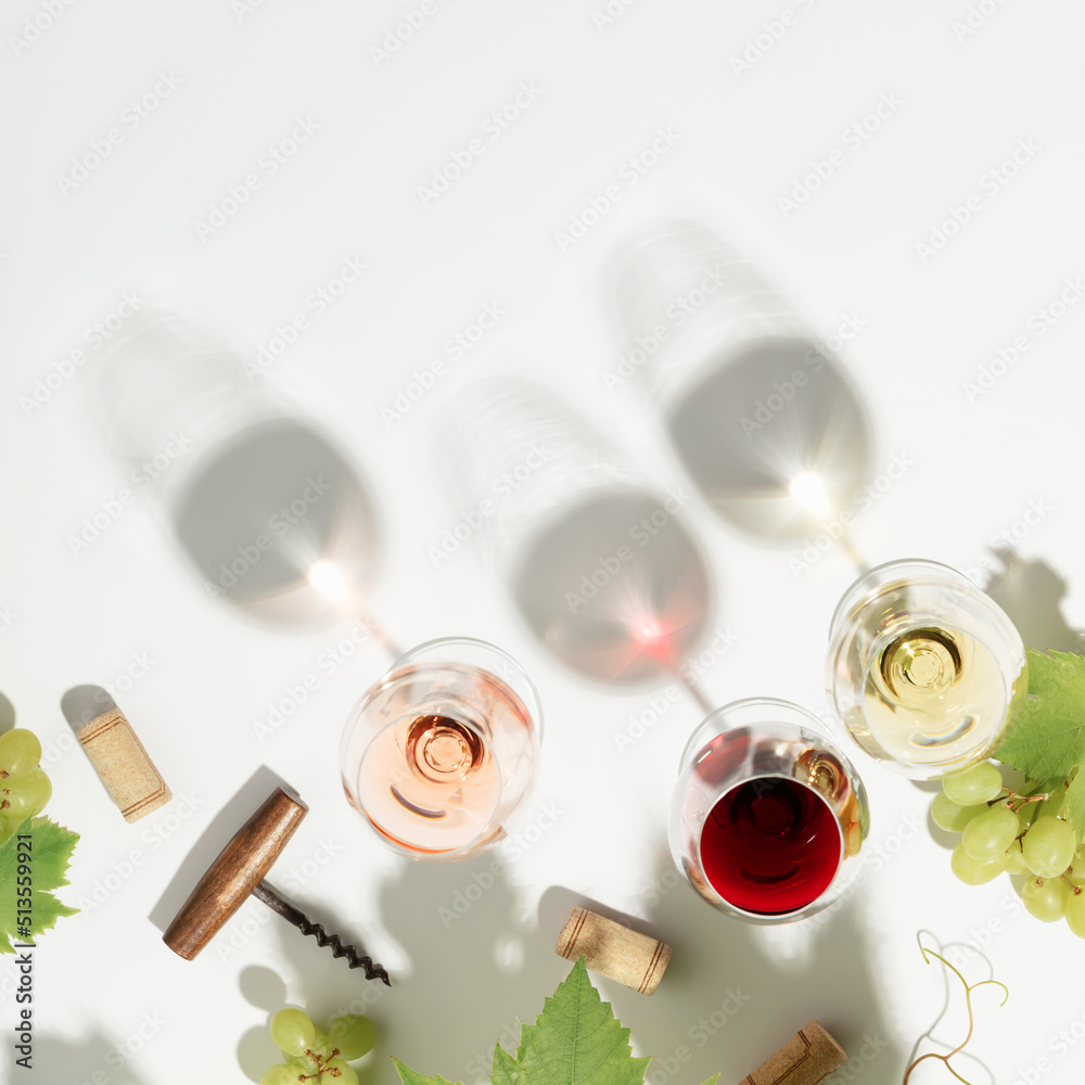 Canvas Prints wine composition with beautiful sunlight and shadows on white background. top view, flat lay