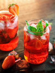 Refreshing summer homemade strawberry lemonade mojito