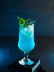 Blue lagoon cocktail on a blue background