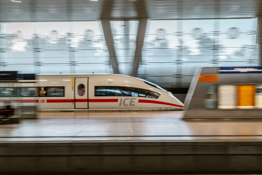 Side View Of German ICE Train In Motion In The Train Station