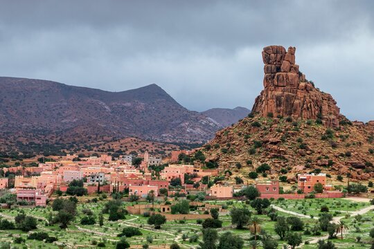 Scenic view of Napoleon's Hat rock formation with beautiful buildings near Tafraout, Morocco