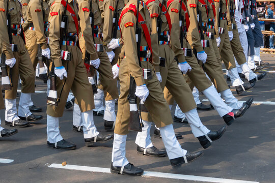 Kolkata, West Bengal, India - 26th January 2020 : India's National Cadet Corps's (NCC) cadets are marching past in rhythm, in khaki dresses and red feather hats, for Indian Republic day celebration.