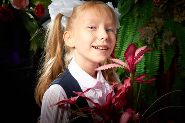 Girl who is elementary school children in uniform having photo shoot in school holiday on September...