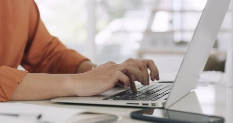 Closeup hands and fingers of a business woman working on a laptop in her office. Female entrepreneur typing on her computer. The success of a small business startup takes hard work and dedication - Powered by Adobe