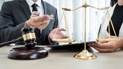 Male lawyer or notary working consulting and discussion to businesswoman client in the office, Law and Legal services concept