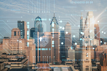 Aerial panoramic cityscape of Philadelphia financial downtown, Pennsylvania, USA. City Hall Clock Tower, sunrise. Padlock hologram. The concept of cyber security to protect confidential information
