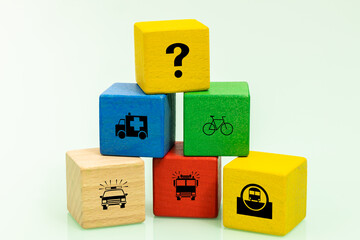 Wooden block with communication and rescue icons and a question mark, Concept of health insurance, rescue, roadside assistance