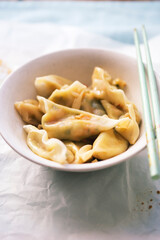 Gyozas Japanese with vegetables and soy sauce 
