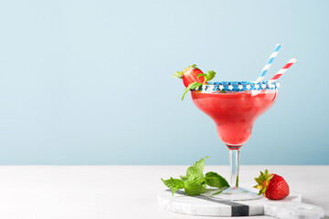 Patriotic Cocktail 4th july. Glass margarita cocktail with strawberry, mint and iced. Drinks for American Independence Day celebration.