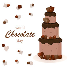 Chocolate cake with small collored chocolates on white background.