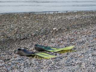 slipers on the beach