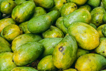 Mango, a green beautiful tropical fruit at a Asian supermarket.