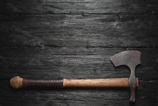 Old viking axe flat lay concept background with copy space.